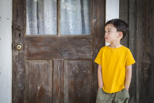 Standing at the Door